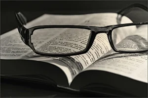 Image of a German Bible with eyeglasses