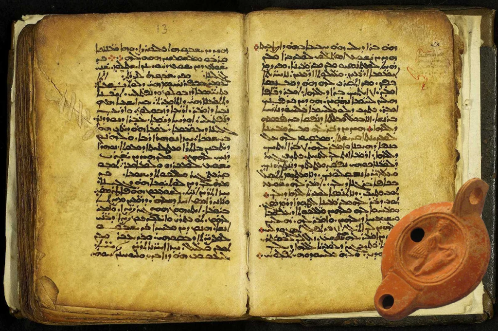 Image of Aramaic manuscript with an ancient oil lamp